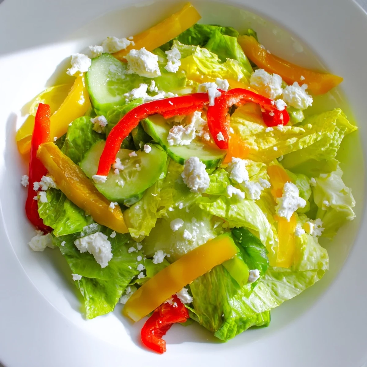Close-up of a refreshing Bella Hadid Salad, showcasing vibrant colors and crisp vegetables, ready to eat.