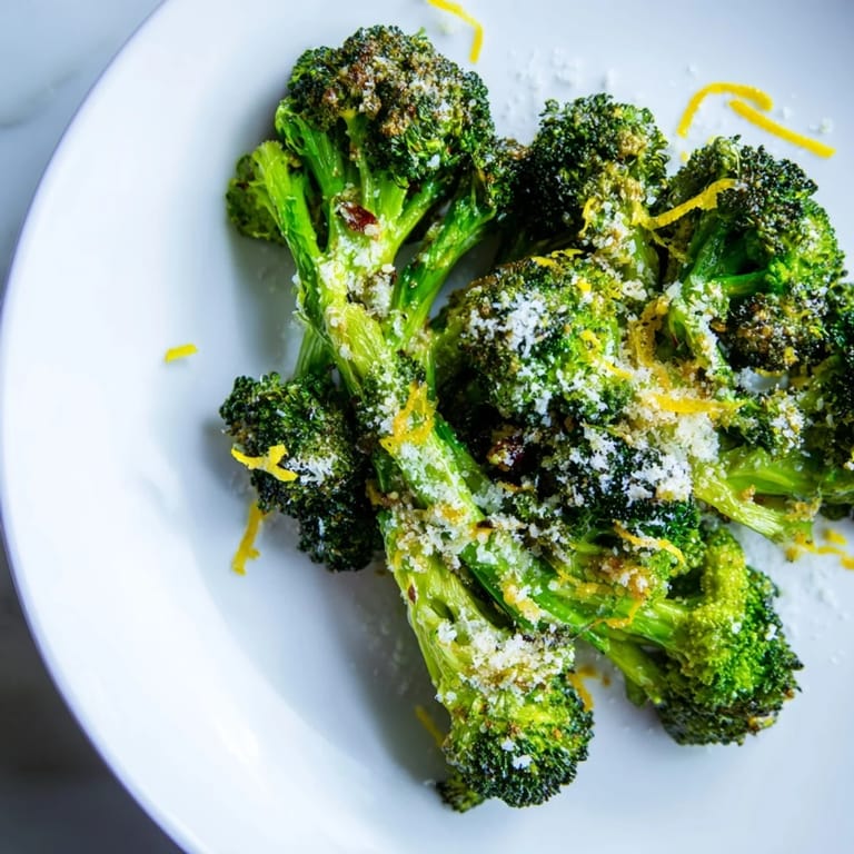 Oven-roasted Simple Garlic and Parmesan Broccoli, bursting with savory flavors and cheesy goodness.
