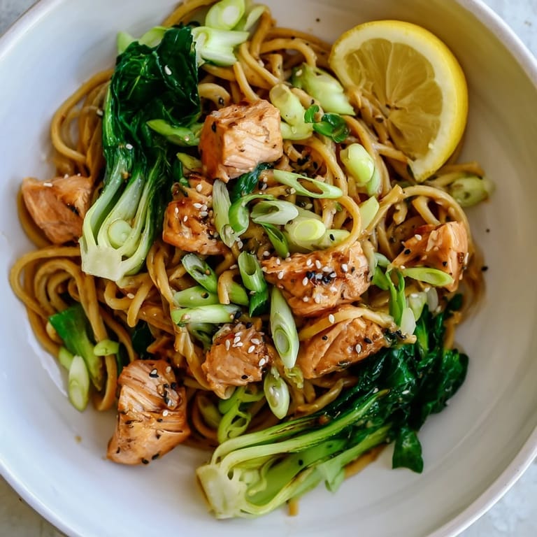 Golden-brown miso butter salmon pasta, with tender salmon pieces and a rich sauce, ready to serve and enjoy.
