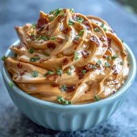 Creamy chipotle lime mayonnaise with smoky peppers and zesty lime, perfect for tacos and sandwiches.  